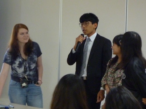 HUSA Program Students Conducting a Presentation