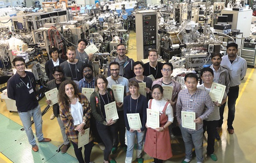 Participants holding their certificates