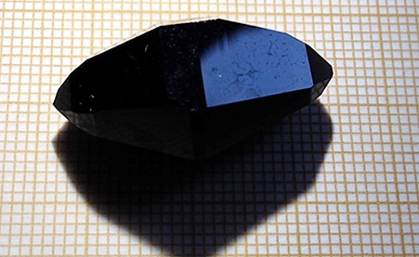 In order to build a chiral magnet (pictured), it is necessary to first design a chiral crystal.