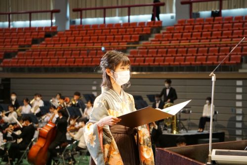 One of the student representatives receiving her diploma