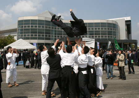 Students celebrate graduation.